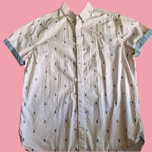 Pink and blue button up shirt with pineapple pattern.